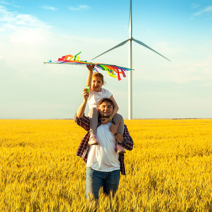 father-and-daughter-having-fun-playing-with-kite
