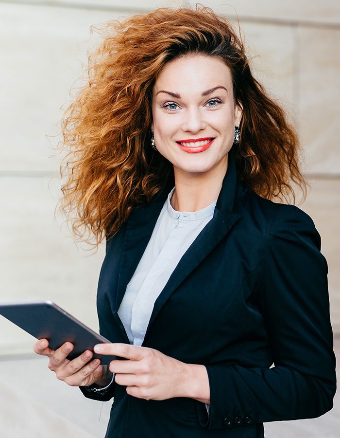 gorgeous-female-in-black-suit-having-curly-bushy